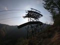 The pylon of the cableway that connects the towns of Albino and Selvino. Green painted pylons to camouflage them in the woods Royalty Free Stock Photo