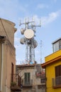 Pylon of parabolas and antennas of GSM in the city Royalty Free Stock Photo