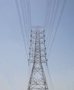 Pylon and power lines at local road Royalty Free Stock Photo