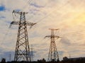 Pylon and transmission power line in sunset Royalty Free Stock Photo