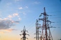 Pylon and transmission power line in sunset Royalty Free Stock Photo