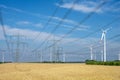 Pylons, power lines and wind turbines Royalty Free Stock Photo