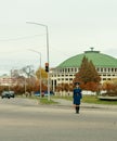 Female traffic police officer directing traffic in Pyongyang, North Korea