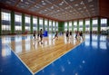 Pyongyang, North Korea-October 12,2017:Korean youth sportsman play volleyball in hall of the Palace of Pioneers and Schoolchildren