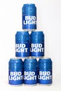 Cans of Bud Light beer stacked in a pyramid.