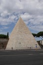 Rome, Italy - September 02, 2017: Beautiful Pyramid of Cestius on the blue sky and cloud
