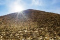The pyramid of Cheops in Giza on the background of the Sun,Cairo, Egypt Royalty Free Stock Photo
