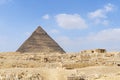Pyramid of Chephren on a blue sky background. Great Pyramids of Giza in the desert. second pyramid Royalty Free Stock Photo