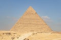 Pyramid of Chephren on a blue sky background. Great Pyramids of Giza in the desert. second pyramid Royalty Free Stock Photo