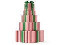 Pyramid of christmas gift boxes with red and green stripes Royalty Free Stock Photo