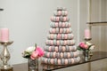 Pyramid of colorful macaroons. Sweets on the holiday. Edible decoration