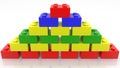 Pyramid of colorful toy bricks on white Royalty Free Stock Photo