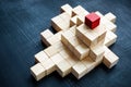 Pyramid of cubes and one red on top. The concept of leadership, success and company hierarchy. Royalty Free Stock Photo