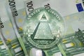 Pyramid, Eye of Providence above 100 euros banknotes. Macro