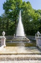 Pyramid Fountain in the park over green trees and blue sky, Peterhof, St. Petersburg Royalty Free Stock Photo