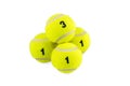 Pyramid of the four tennis balls Royalty Free Stock Photo