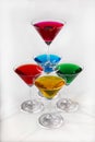 Pyramid from glasses with colored drinks Royalty Free Stock Photo