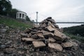 Pyramid of gray stones on the bank of a mountain river.