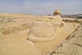 The pyramid of Chephren with a statue of a sphinx in the foreground Royalty Free Stock Photo