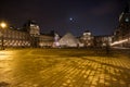 Pyramid Louvre museum at night in Paris