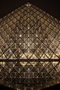 Louvre pyramid museum in Paris at night light, Musee du Louvre, France Royalty Free Stock Photo