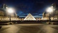 The pyramid of Louvre by night, Louvre museum, Paris, France Royalty Free Stock Photo