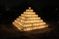 Pyramid made from Ice with Candles Inside Light up the Night