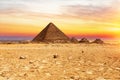 The Pyramid or Menkaure and the Pyramids of the queens at sunset, Giza, Egypt Royalty Free Stock Photo