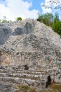 Pyramid of Nohoch Mul in Coba. Ancient maya building. Travel