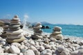 Pyramid of pebbles on a sea beach.