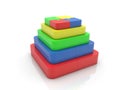 Pyramid of puzzle blocks of different sizes and colors