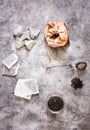 Pyramid and rectangle shaped tea bag mock up set on gray  background.  Or great black tea loose leaf. Eco-friendly alternatives Royalty Free Stock Photo