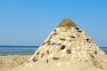Pyramid of sand and shells Royalty Free Stock Photo
