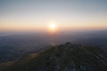 Rising sun in front of the Rtanj mountain peak Royalty Free Stock Photo