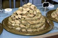 Pyramid shaped Arabic baklava on a golden tray