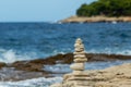 Pyramid stacked stone on seaside Royalty Free Stock Photo