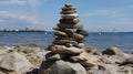 Pyramid of stone stack each other at the rocky beach. Balance rock or tower of stone