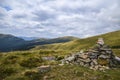 Pyramid of stones in the background beautiful view of mountains landscape of Svydovets ridge Royalty Free Stock Photo