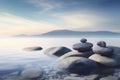 Pyramid stones balance on the sand of the beach. The object is in focus, the background is blurred. Neural network AI Royalty Free Stock Photo