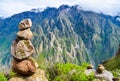 Pyramid of stones balancing with mountain background in Colca canyon in Peru Royalty Free Stock Photo