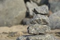 Pyramid of stones, front view, selective focus