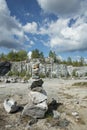 Pyramid of stones in a marble canyon. Royalty Free Stock Photo