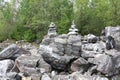 Pyramid of stones in marble canyon in summer Royalty Free Stock Photo