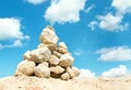 Pyramid of stones over blue sky Royalty Free Stock Photo