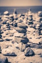 Pyramid of stones in the sand at the beach