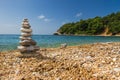 Pyramid of stones on the sea shore Royalty Free Stock Photo