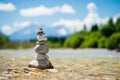 Pyramid of stones standing in the water