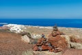 Pyramid of stones on top mountain. Royalty Free Stock Photo