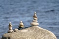Pyramid of stones. Unstable balance of stone objects. Royalty Free Stock Photo