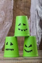 Pyramid of three disposable cups